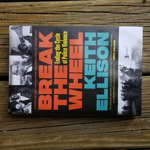 Break the Wheel: Ending the Cycle of Police Violence. signed by Keith Ellison!